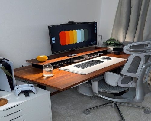 Modern minimal office workspace with ergonomic setup